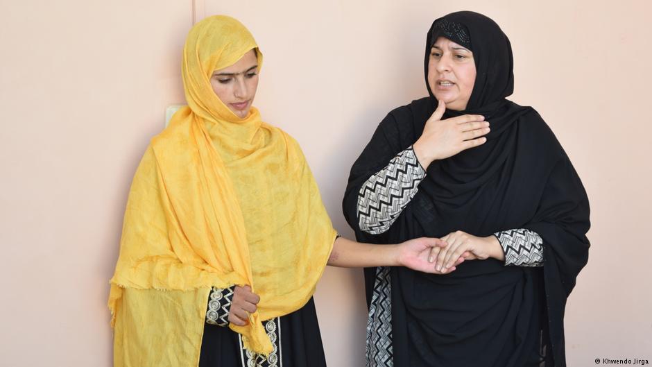 Tabassum Aadnan (right) talks to a younger woman in the Jirga (Photo: Khwendo Jirga)