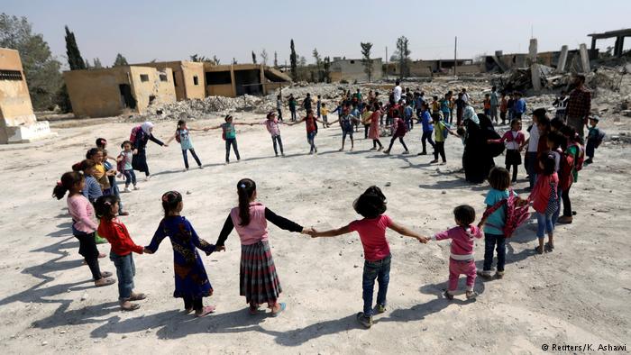 Children playing at a school in al-Saflaniyeh (photo: Reuters/K. Ashawi)