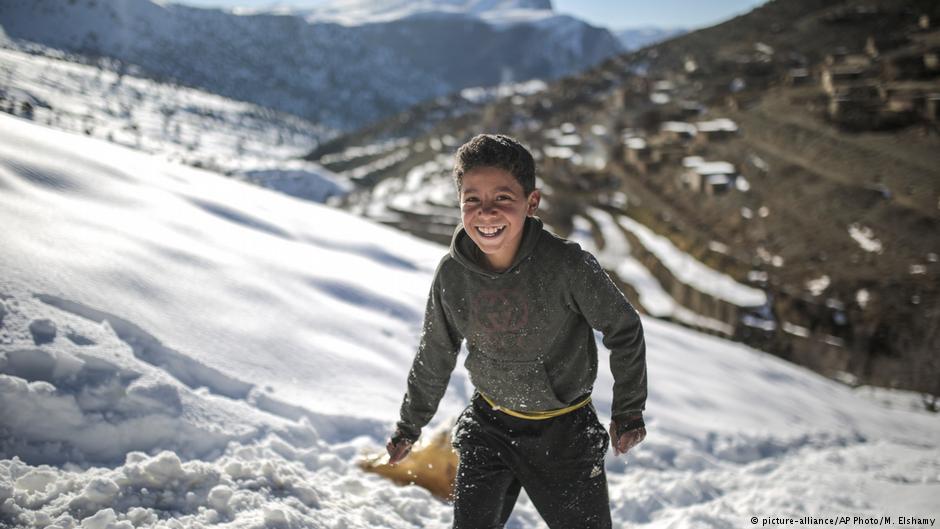 Mouhcine, 11, enjoys sledging on snow covered mountains in Tighanmin, a Middle Atlas village near Azilal, central Morocco (photo: AP Photo/Mosa'ab Elshamy)