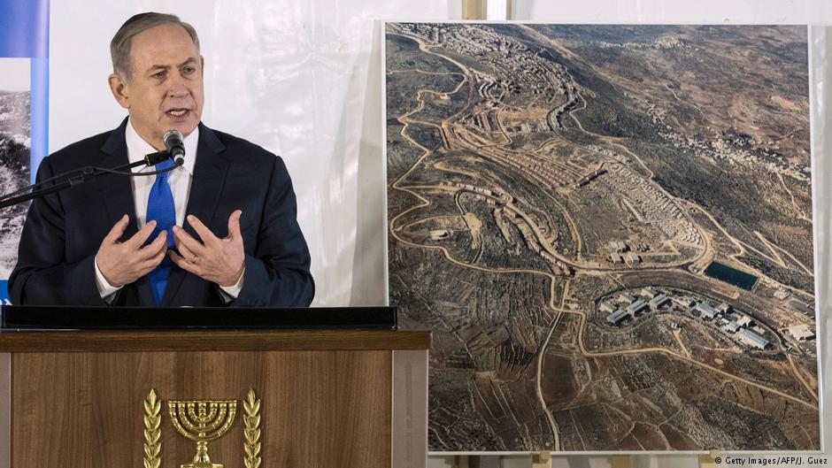 Israeli Prime Minister Benjamin Netanyahu delivers a speech during a memorial ceremony for Ron Nahman, the founder of Ariel, one of the largest Israeli settlements in the occupied West Bank on 2 February 2017 in Ariel (photo: Getty Images/AFP/J. Guez)