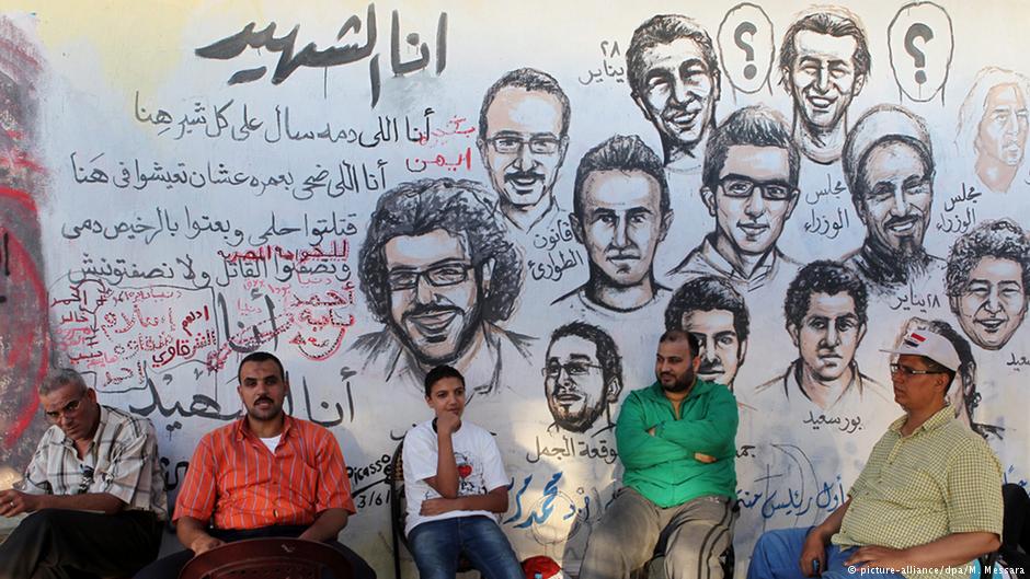 Wandmalereien in der Nähe des Tahrirplatzes in Kairo: Aktivisten der Revolution von 2011; Foto: picture-alliance/dpa