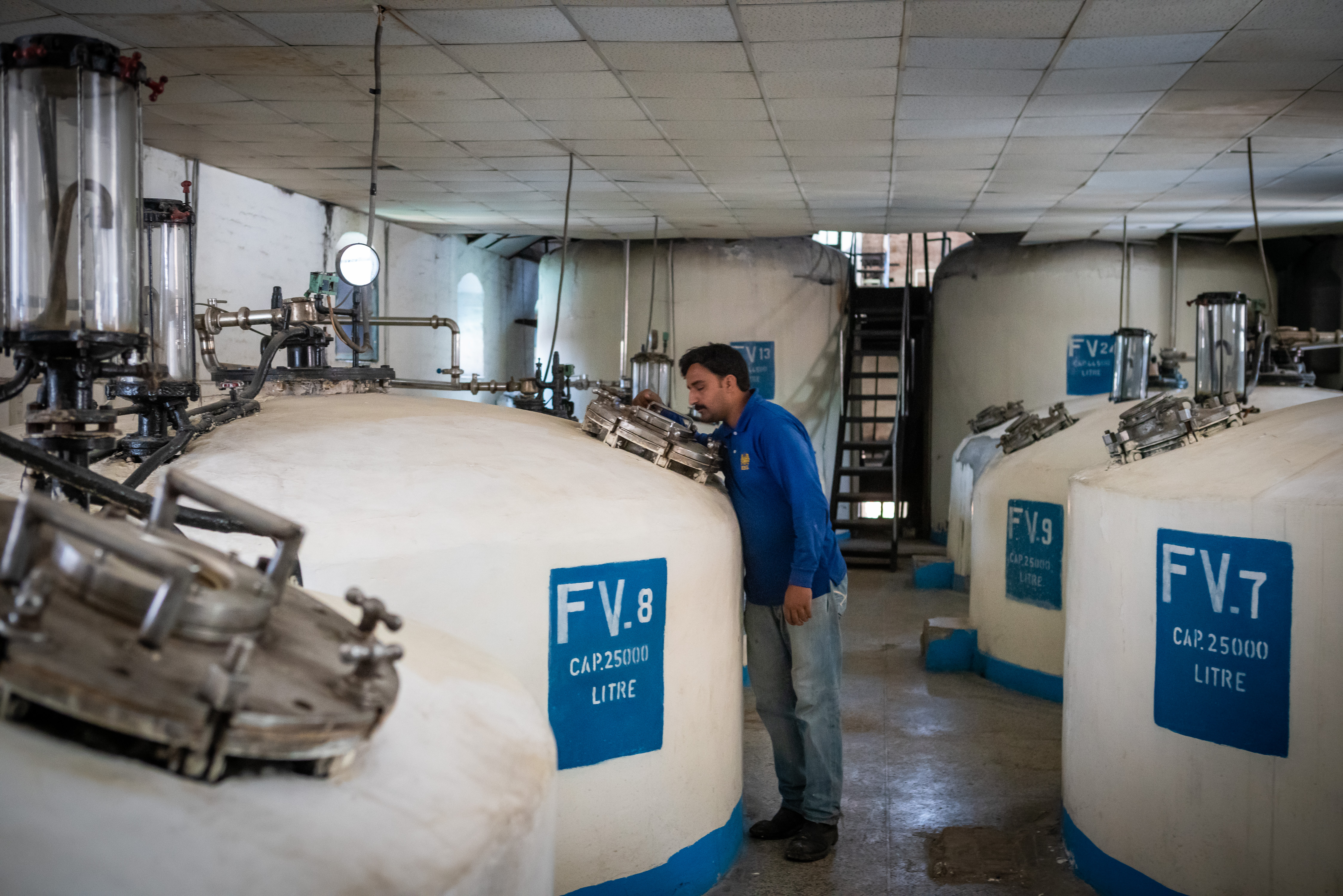 An engineer monitors the tanks used for beer-making at the Murree Brewery (photo: Philipp Breu)