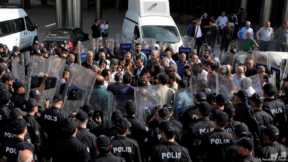Pro-Kurdish People’s Democratic party (HDP) lawmakers are surrounded by riot police as they protest against detention of their local politicians on 21 October 2019 in Diyarbakir, Turkey (photo: Reuters/Sertac Kayar/File Photo)