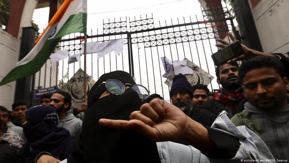 Indian students at Jamia Millia Islamia University shout slogans during a protest in New Delhi, India, on 16 December 2019 (photo: AP/Manish Swarup)