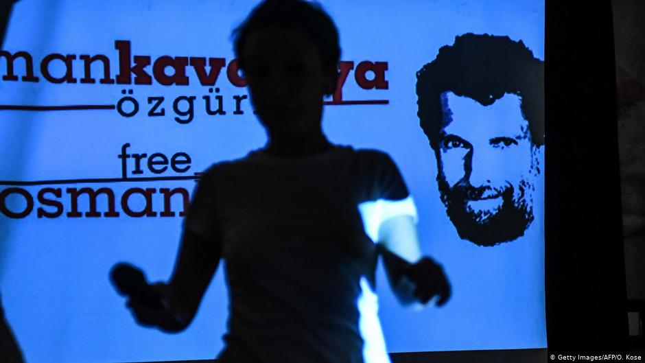 Solidarity with Osman Kavala – poster at a press conference given by his lawyers in October 2018 (photo: AFP/Getty Images)