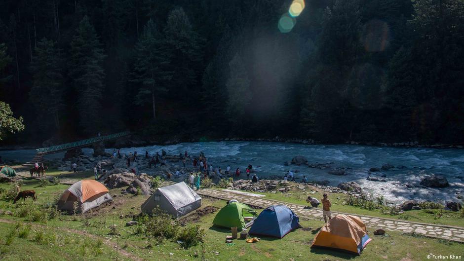 Tourists camping on the banks of the River Lidder, Pahalgam, Jammu and Kashmir (photo: Furkan Khan)