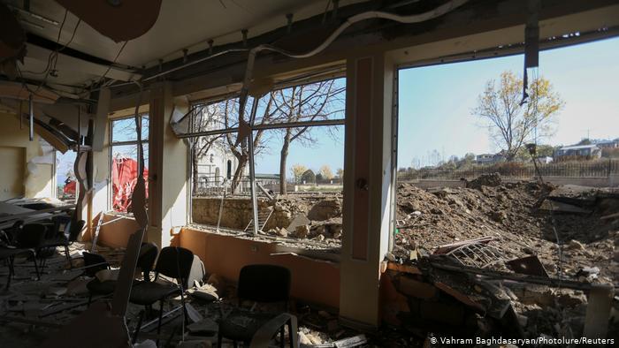 View from inside a building in Nagorno-Karabakh, the windows blown out, rubble on the floor (photo: Vahram Baghdasaryan/Photolure/Reuters)