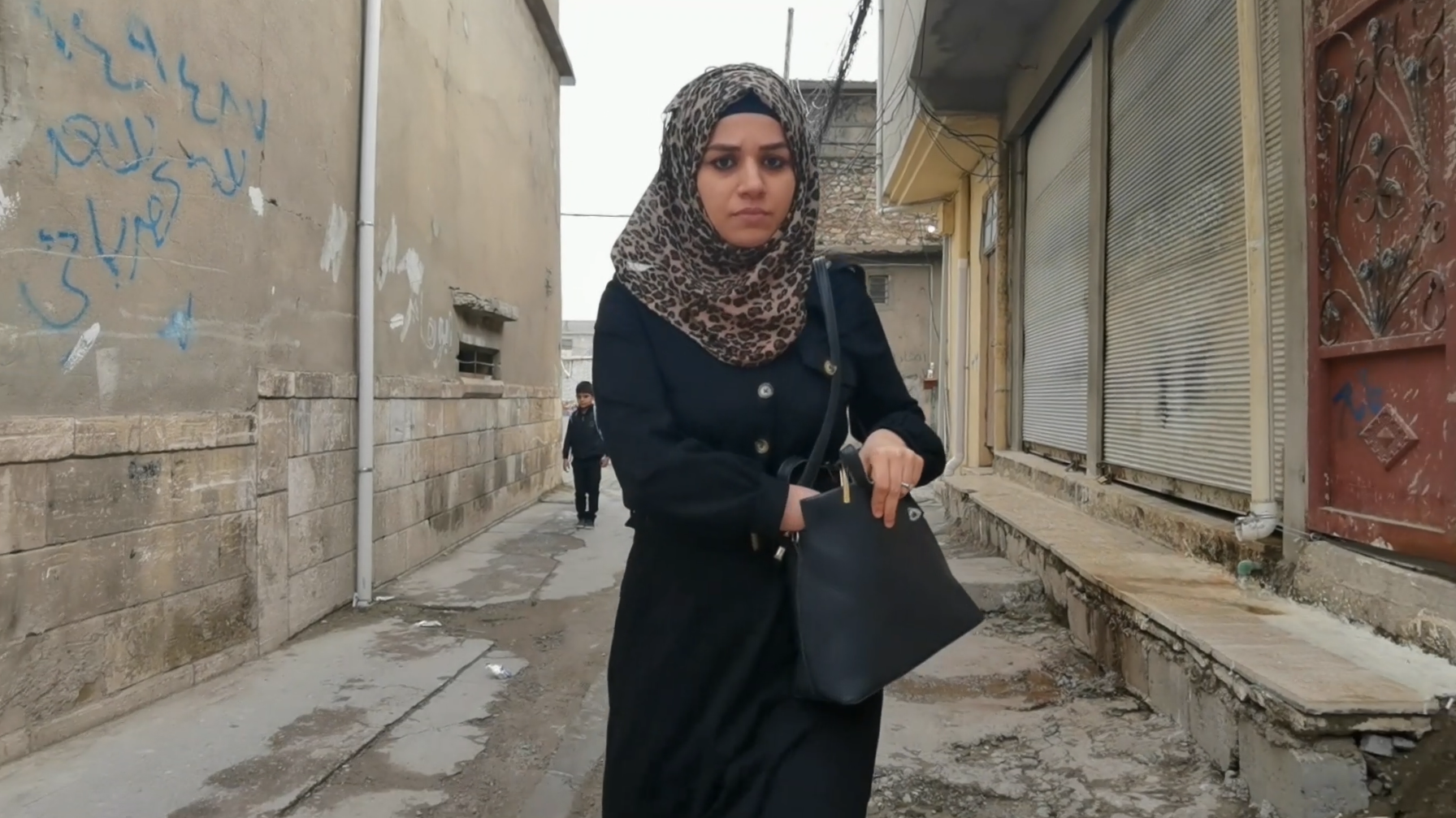 Still from the film "Identity Limits", in which a mother struggles against the general perception in her Mosul neighbourhood that her husband was a "Daeshi," a member of IS