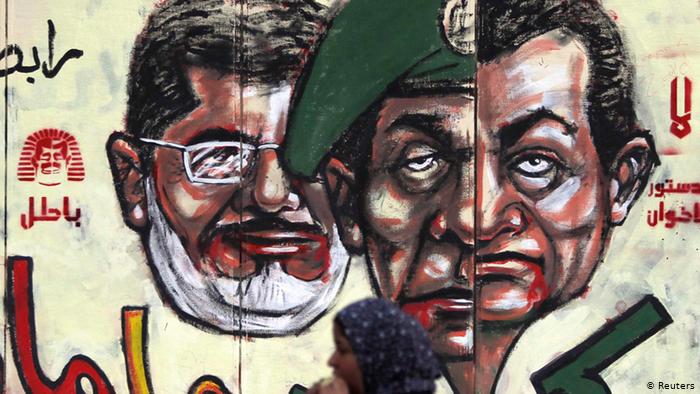This street painting shows Egypt's former ruler Hosni Mubarak, former military chief Mohamed Tantawy and fomer President Mohamed Morsi (photo: Reuters) 