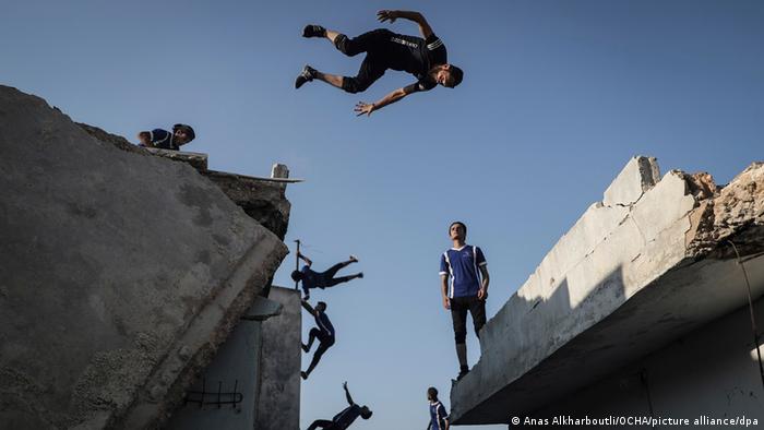 Anas Alkharboutli captures parkour athletes among destroyed buildings in 2020