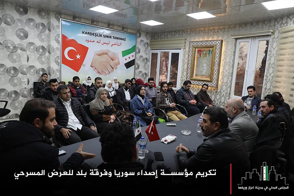 "Brotherhood knows no bounds" - local authority meeting in Azaz, northern Syria, with Turkish and SIG flags clearly on display (source: Azaz.c.local; Facebook)