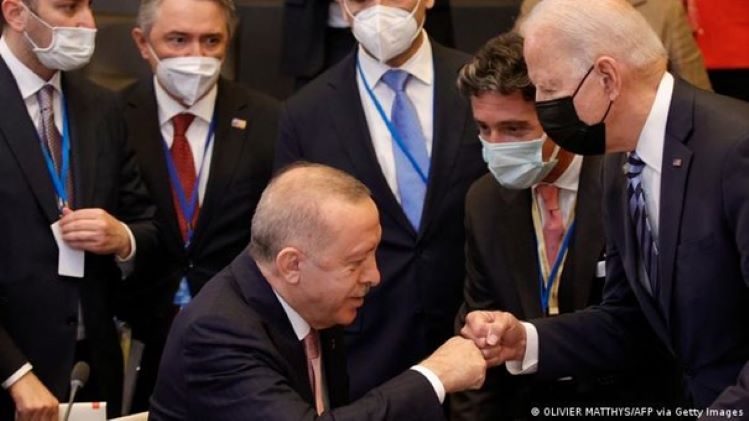 Erdogan and Biden bump fists at the Brussels summit in June (photo: Olivier Matthys/AFP/Getty Images)