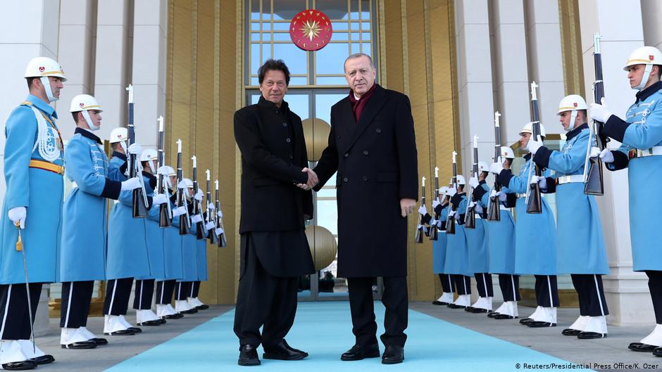 Turkish President Tayyip Erdogan shakes hands with Pakistani Prime Minister Imran Khan during a welcoming ceremony at the Presidential Palace in Ankara, Turkey, 4 January 2019 (photo: Kayhan Ozer/Presidential Press Office/REUTERS)