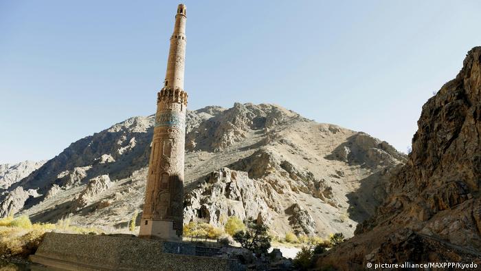 Brick minaret in mountainous area