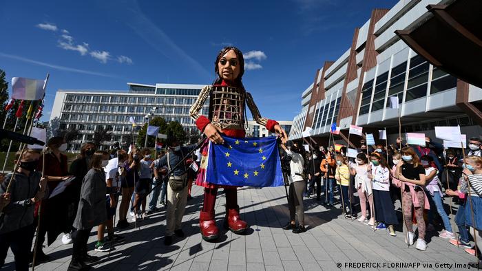 Little Amal in front of the EU parliament building in Strasbourg, France (photo; Frederick Florin/AFP/Getty Images)