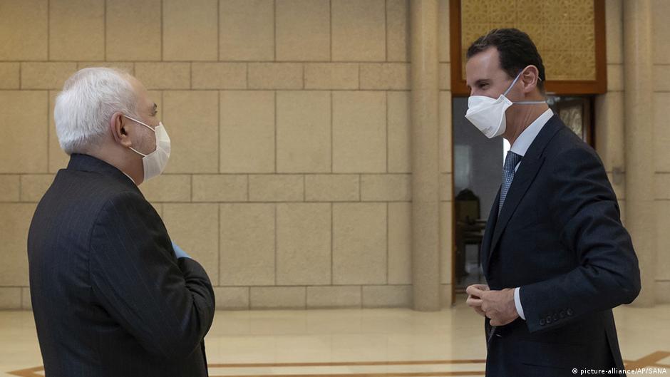 Syria's President Bashar al Assad and Iran's Foreign Minister Jawad Zarif (photo: picture-alliance/AP/SANA)