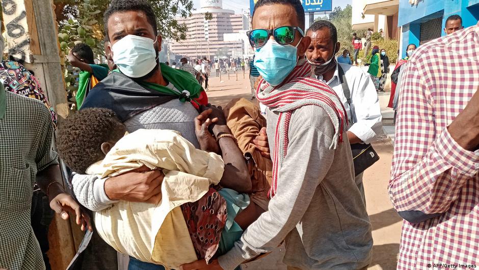 Injured during protests against military coup in Sudan (photo: AFP/Getty Images)