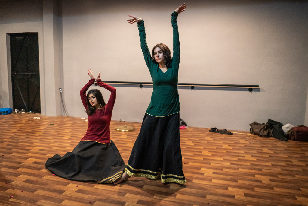 Two female dancers in the rehearsal room of The Colony, Lahore, Pakistan (photo: Philip Breu)