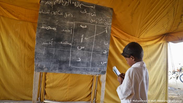 Yemeni children continue education in tents after most schools were damaged or collapsed due to the civil war