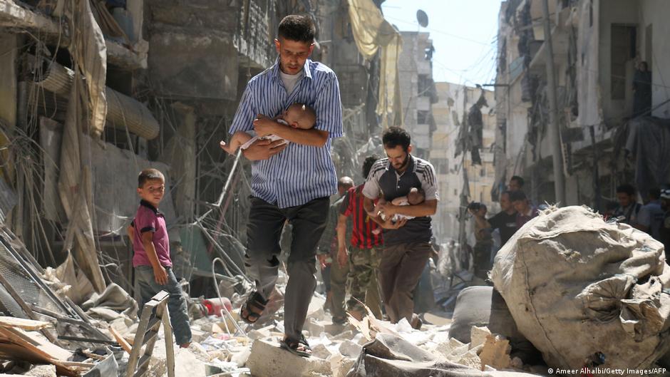 Rescuing babies from the rubble in Aleppo, Syria (photo: Getty Images/AFP)
