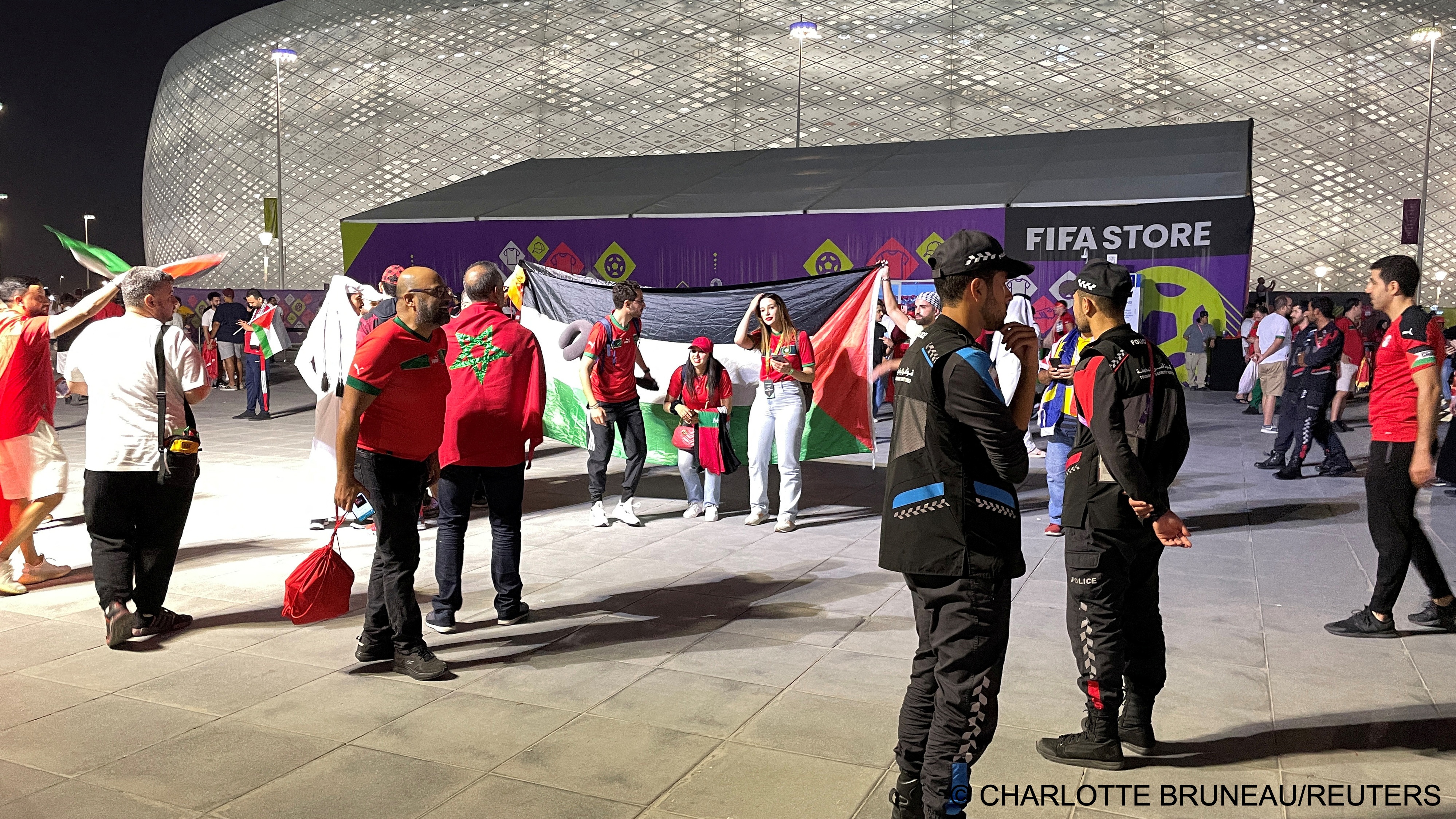 General view as fans hold a Palestine flag outside Al Thumama Stadium, Doha, Qatar (photo: REUTERS/Charlotte Bruneau)