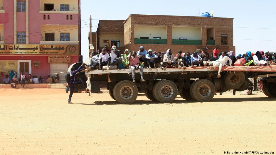 People flee the fighting in Khartoum (image: Ebrahim Hamid/AFP/Getty Images)