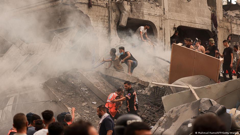 Rescue workers search for survivors after Israeli airstrikes hit Jabaliya refugee camp in north of Gaza
