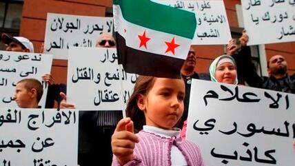 Demonstration gegen das Assad-Regime vor der syrischen Botschaft in Moskau; Foto: AP