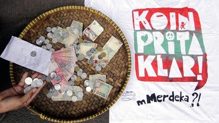 Kampagne Eine Münze für Prita; Foto: NURANI NUUTONG/AFP/Getty Images