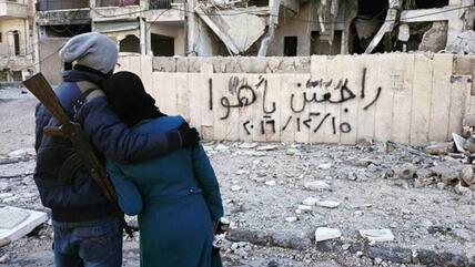 "راجعين يا هوا".. صاحبا أشهر صورة في حلب لا يزالان محاصرين.