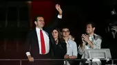 Istanbul Mayor Ekrem Imamoğlu waves in front of supporters as they celebrate outside the main municipality building following municipal elections across Turkey, Istanbul, 31 March 2024