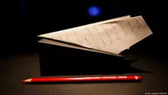 Red pencil and paper aeroplane from Can Dundar's Berlin installation.